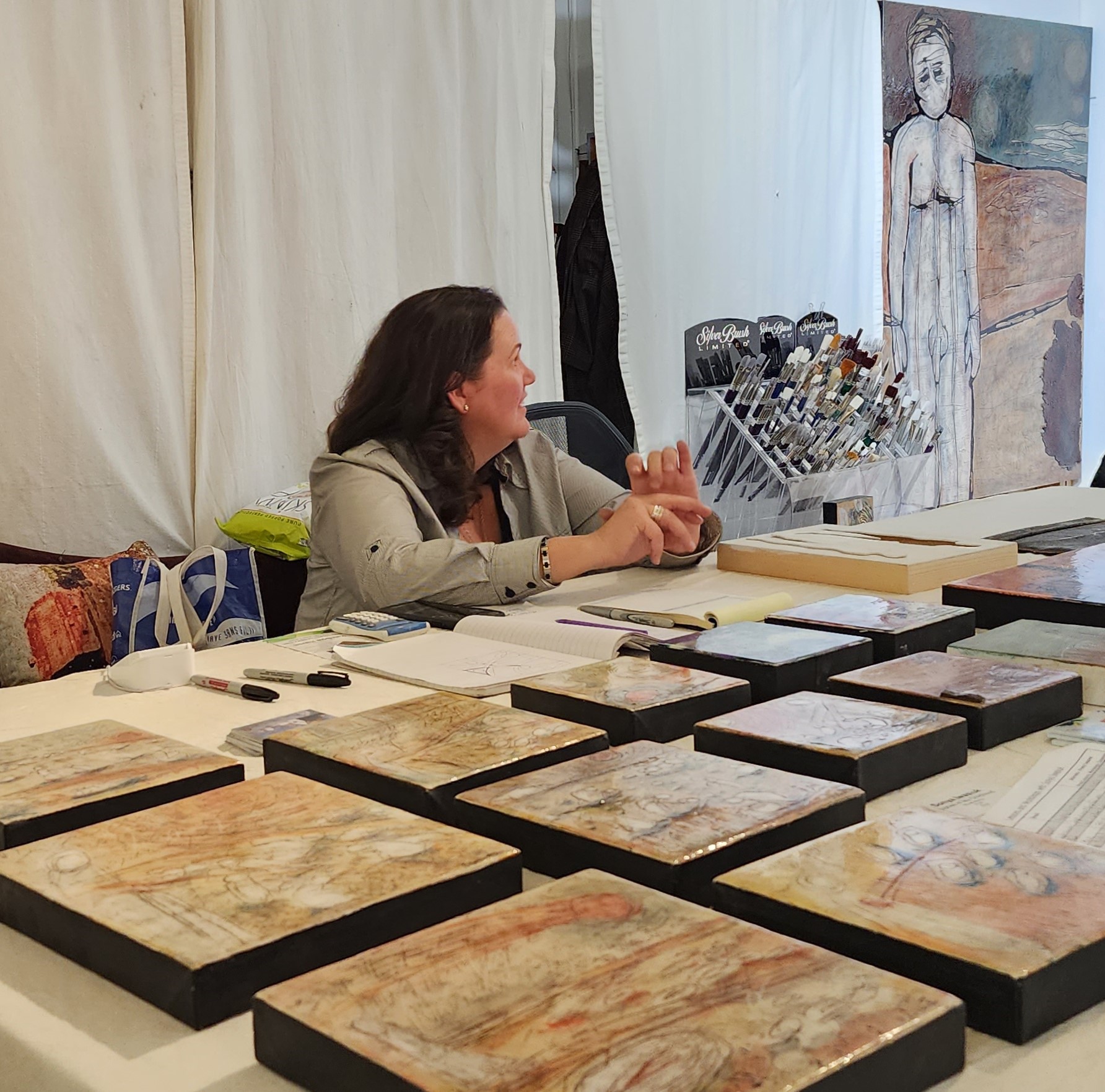 Photo of Sonya Iwasiuk talking to a patron
